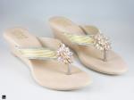 Heel type sandals for ladies in gold  with center stone in floral design - 1