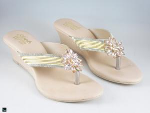 Heel type sandals for ladies in gold  with center stone in floral design