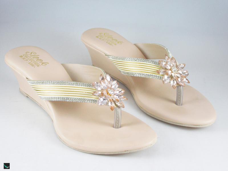 Heel type sandals for ladies in gold  with center stone in floral design