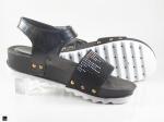 Pu sandals with studs in black - 2