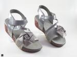 Flower piece on sandal in grey - 2