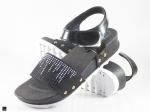 Pu sandals with studs in black - 1
