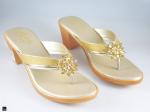 Heel type sandals for ladies in gold  with center stone in floral design - 1